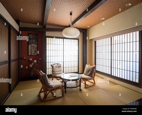 A modern Japanese-style room (washitsu, tatami room), with shoji screen ...