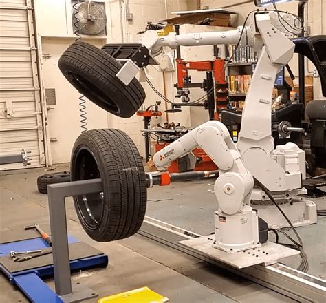 Robot Integration For Tire Removalinstallation Station Industrial