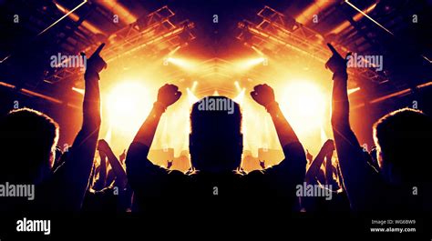 Concert hall crowded with clapping people Stock Photo - Alamy