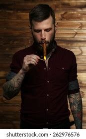 Beardedm Guy Tattooed Hands Smoking Cigar Stock Photo Edit Now