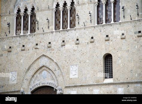 Main Entrance To Gothic Palazzo Salimbeni Headquarters Of Banca Monte