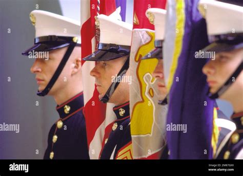 A Marine Color Guard Participates In A Ceremony Aboard The Battleship