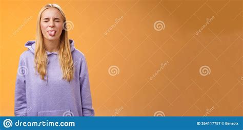 Playful Amused Charismatic Young Funny Blond Girl Having Fun Close Eyes