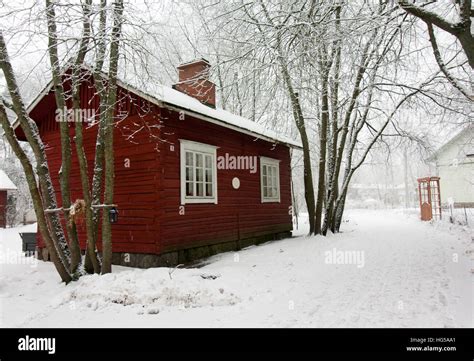 Colorful wooden houses snowed in Finland at winter Stock Photo - Alamy