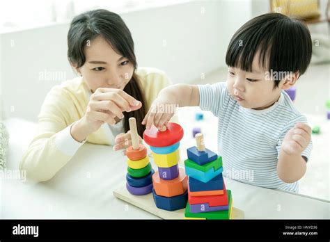 Loving Mother And Baby Boy Playing Together Stock Photo Alamy