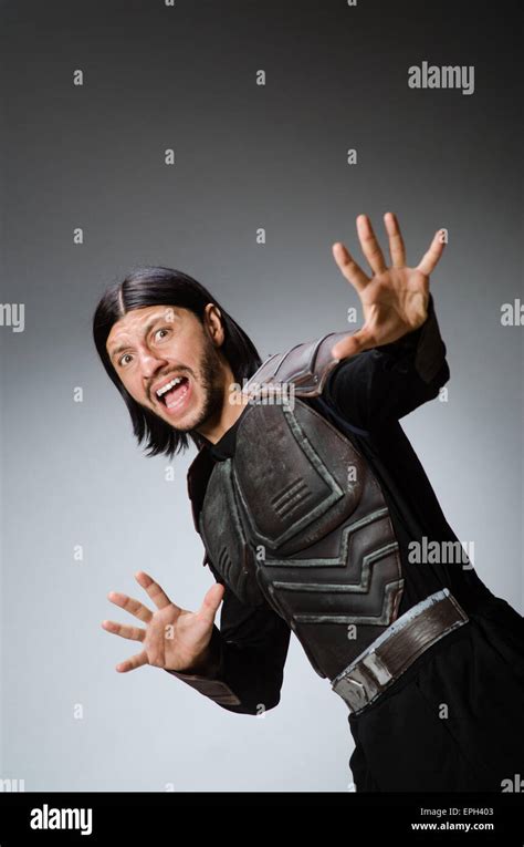 Angry Warrior Against Dark Background Stock Photo Alamy