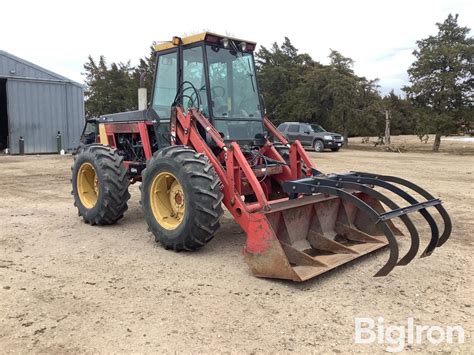 Versatile Bi Directional Wd Tractor W Grapple Loader Bigiron