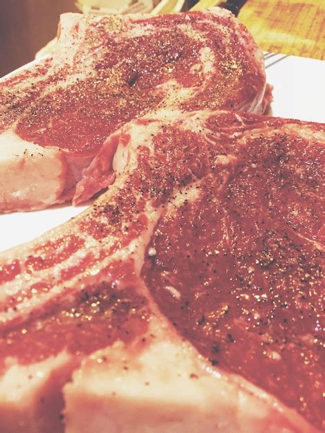 Premium Photo Seasoned Rib Eye Steaks