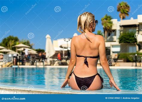 Woman In Bikini Is Posing In The Swimming Pool Wellness And Spa Luxury