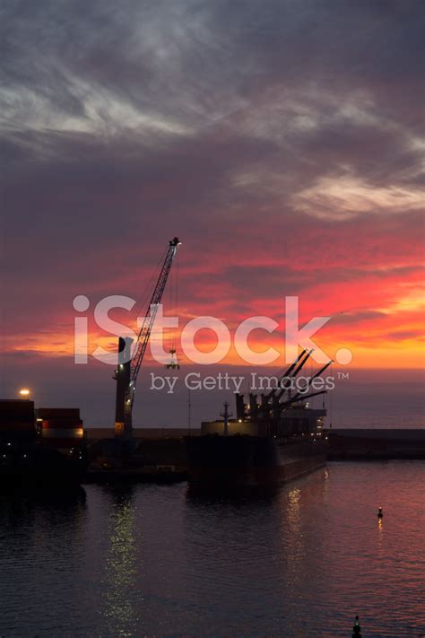 Cargo Ship At Sunset Stock Photo | Royalty-Free | FreeImages