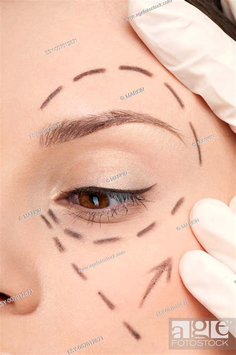 Beautician Touch And Draw Correction Lines On Woman Face Foto De Stock