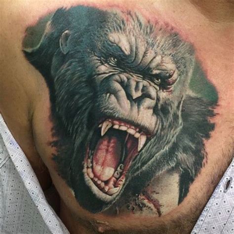 A Mans Chest With An Angry Gorilla Tattoo On The Chest And His Mouth Open