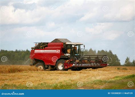 Harvesting Grain Crops in the Field with Combine Harvesters Stock Image ...