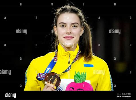 Yaroslava Mahuchikh Of Ukraine Stands With Her Gold Medal On The Podium After Winning The