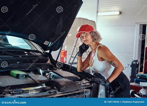 Professional Female Worker Is Fixing Car Stock Image Image Of