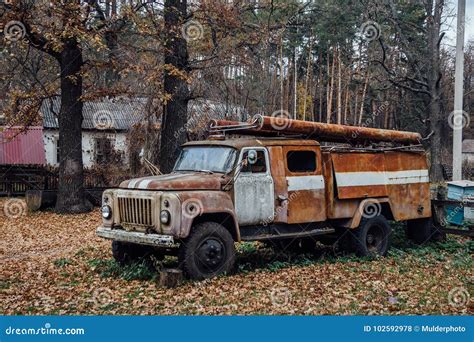 Old Rusty Abandoned Soviet Fire Truck In The Village Stock Photo