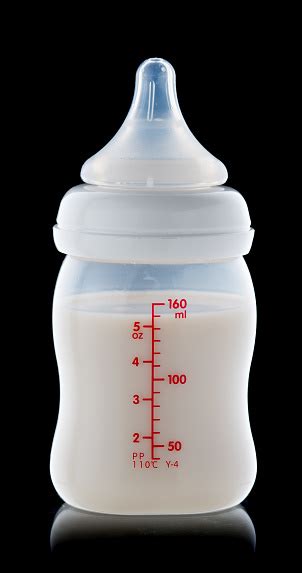 Baby Milk Bottle Isolated On Black Background Stock Photo - Download Image Now - iStock