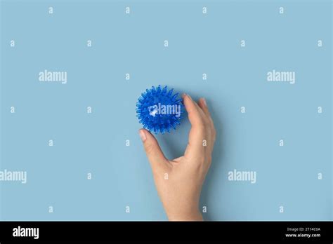 Tactile Knobby Ball On Blue Studio Background Sensory Massage Textured