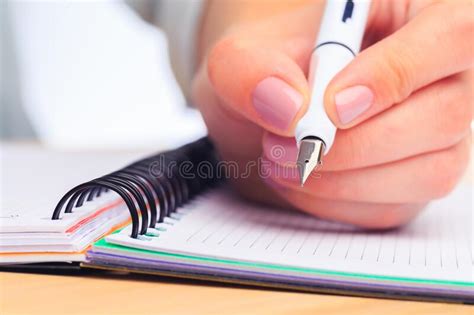 Female Hands Write In A Notebook Office Place Close Up View Image