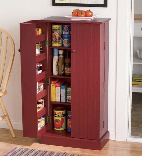 Red Kitchen Pantry From Homevisions Red Kitchen Kitchen Storage