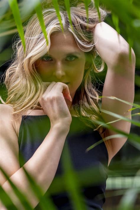 A Lovely Blonde Model Poses Outdoor While Enjoying The Spring Weather Stock Photo Image Of