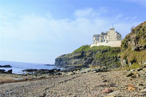 Standing On A Spectacular Location On Top Of Cliffs Above The Sea