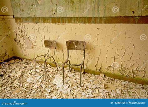 Broken Chairs In A Decayed Old Classroom Stock Image Image Of Decay