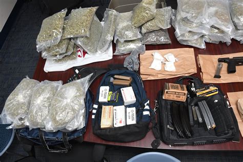 Mpd Search Warrant Nets Drugs And Firearms 2 Arrested