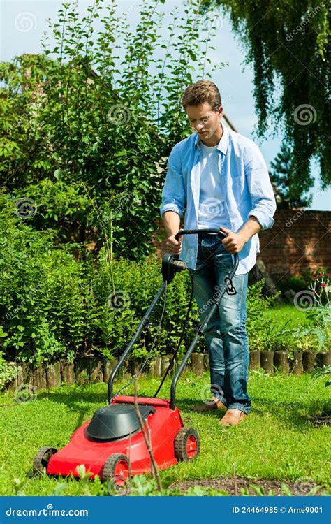 Man Is Mowing The Lawn In Summer Stock Image Image Of Country Grass