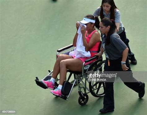 Peng Shuai Injury Photos and Premium High Res Pictures - Getty Images