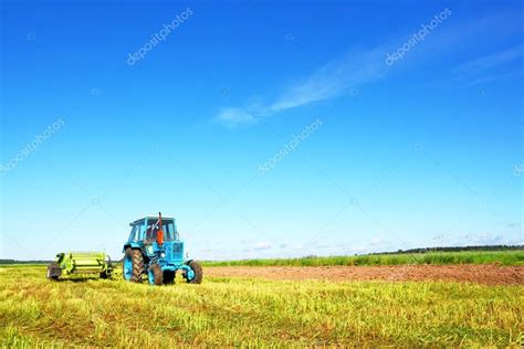 Tractor on a farmer field — Stock Photo © hramovnick #24528467