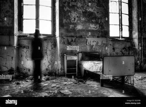 Italy. Abandoned psychiatric hospital room Stock Photo - Alamy