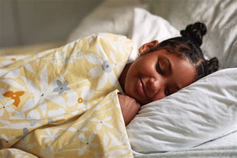 Black Child Sleeping In Bed Stock Photos Pictures And Royalty Free