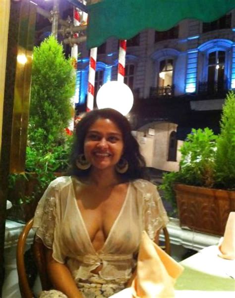 Desi Lady In Her Transparent Dress Showing Her Boobs And Posing Almost