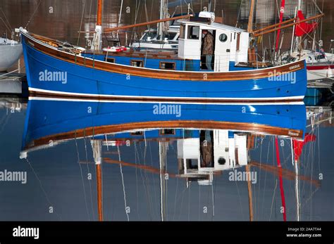 Fishing boats in harbour,Lochinver, Assynt, Scotland Stock Photo - Alamy