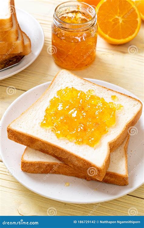 Slices Of Bread With Orange Jam Stock Photo Image Of Closeup Orange