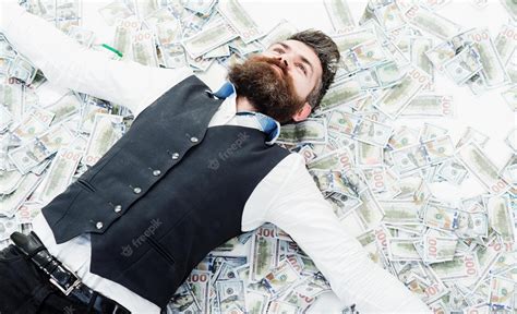 Premium Photo Businessman Lying In Many Banknotes Saving Money