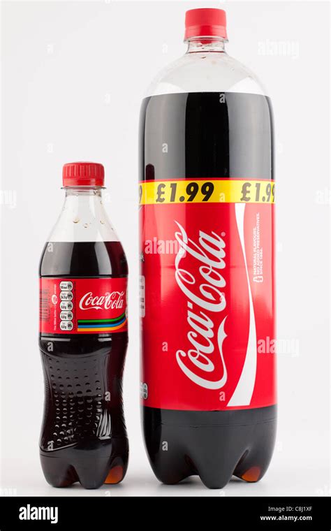 Two Plastic Bottles Of Coca Cola One Large One Small Stock Photo Alamy