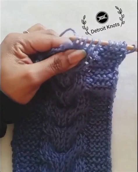 Someone Is Knitting Something With Their Hands