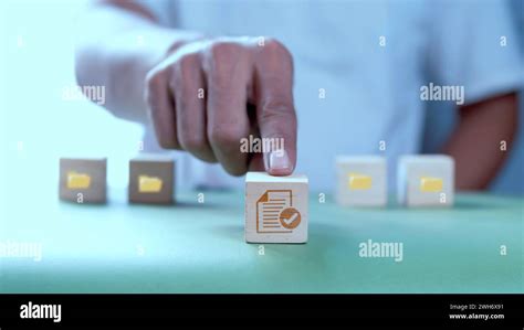 Businessman Pushing Wooden Cube With Documents Icon Search And Manage