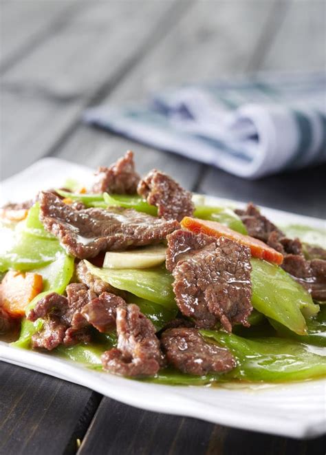 Delicious Chinese Food Fried Beef With Bitter Gourd Stock Photo