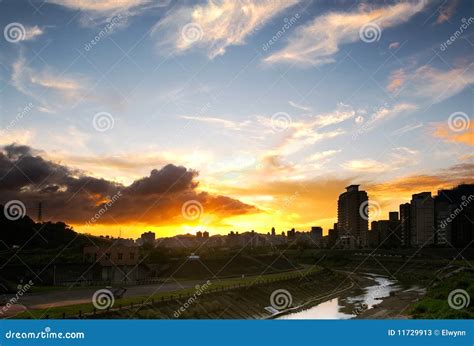 Cityscape of sunset stock image. Image of dramatic, building - 11729913