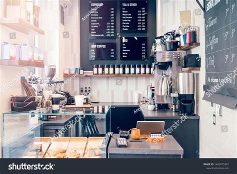 A Coffee Shop With Menus On The Wall