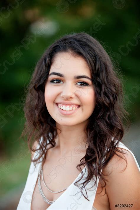 Beautiful Brunette Girl Relaxing In The Park Stock Photo 3202427 Crushpixel
