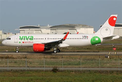 Download Viva Aerobus Airplane Inside Airport Fence Wallpaper ...