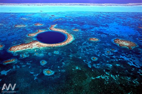 Aerial photo of Great Blue Hole off the coast of Belize. | Great blue ...