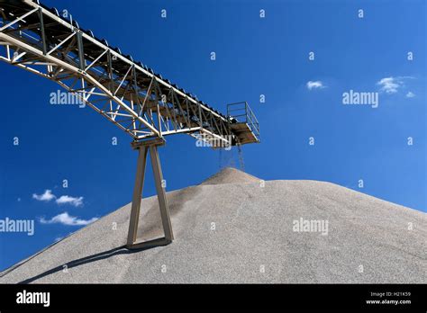 Conveyor Belt Above Heap Of Gravel In Gravel Pit Stock Photo Alamy