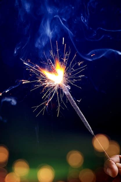 Premium Photo | The burning sparklers diwali festival. Celebrating ...