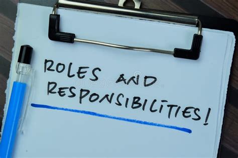 Roles And Responsibilities Text Written In Torn Paper Stock Image