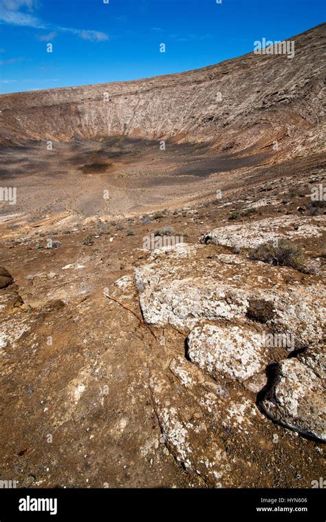 Stone In Los Volcanes Lanzarote Spain Volcanic Timanfaya Rock Sky Hill